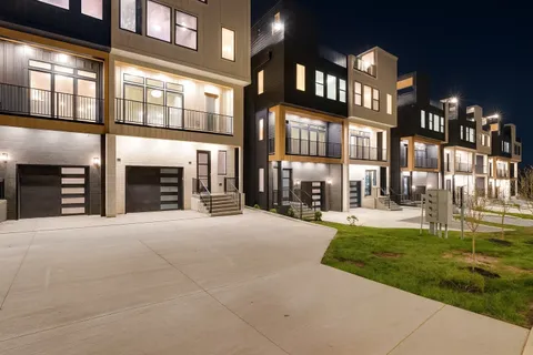 a view of a building with a yard