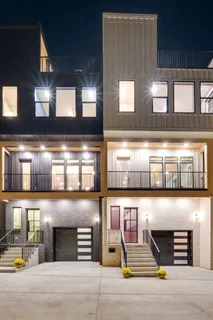 a view of a building with garage