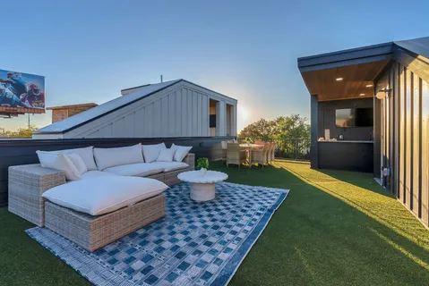 a kitchen with wooden cabinets and a sink