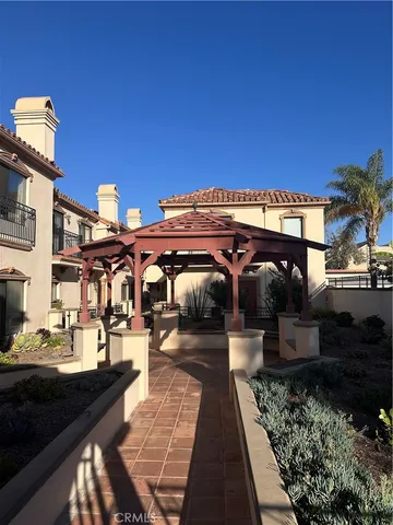 a view of a terrace with chairs