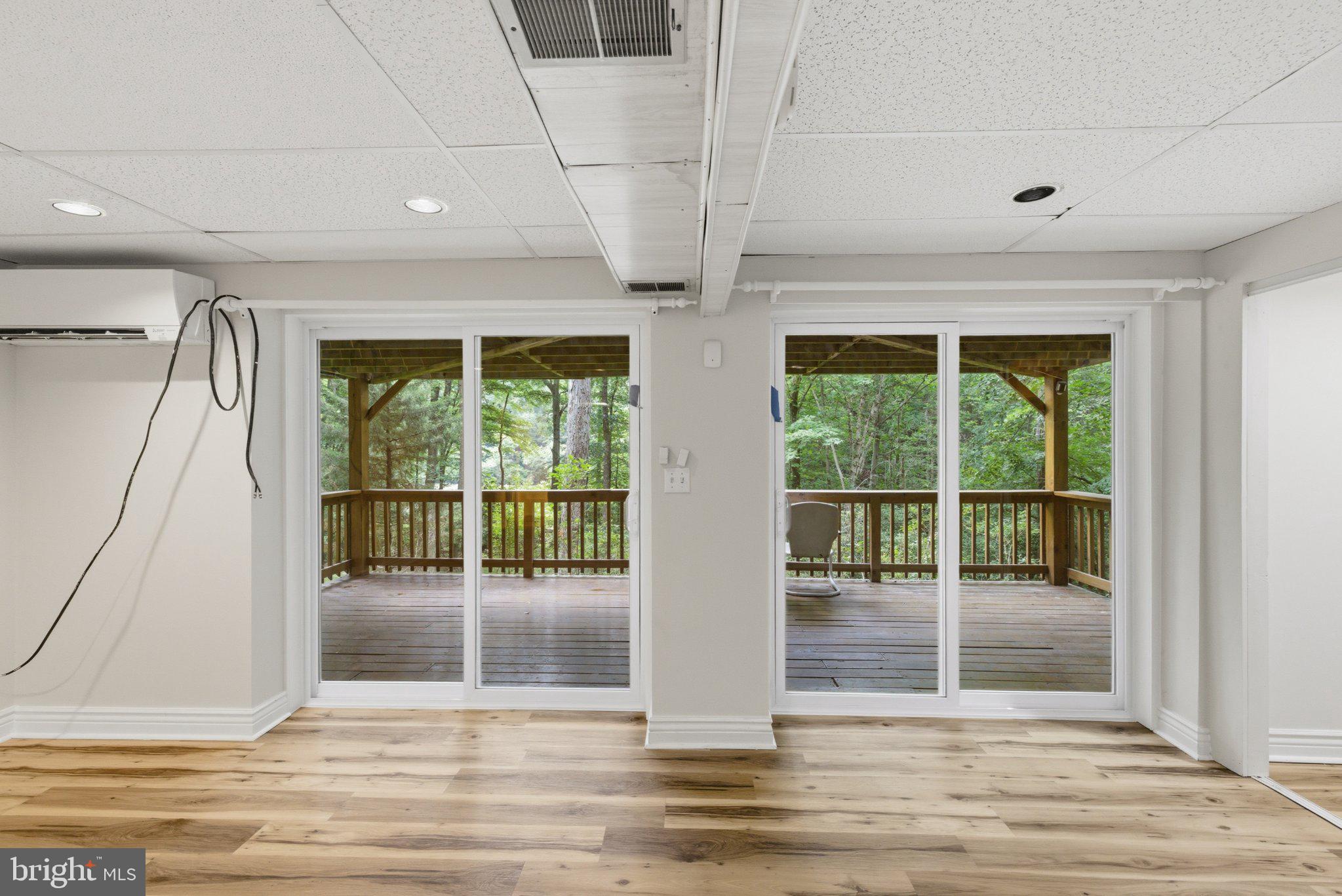 11492 Rawhide Road Lusby, MD 20657 - Photo 15 of 20 Serene indoor-outdoor living space.