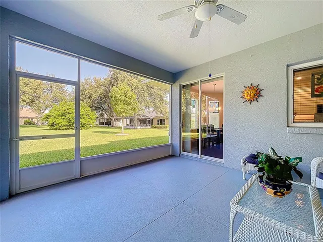 an aerial view of multiple houses with outdoor space