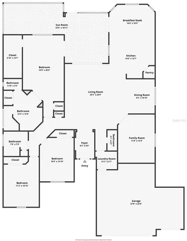 a living room with furniture fireplace and wooden floor