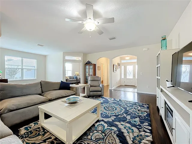 a kitchen with stainless steel appliances a refrigerator sink and cabinets
