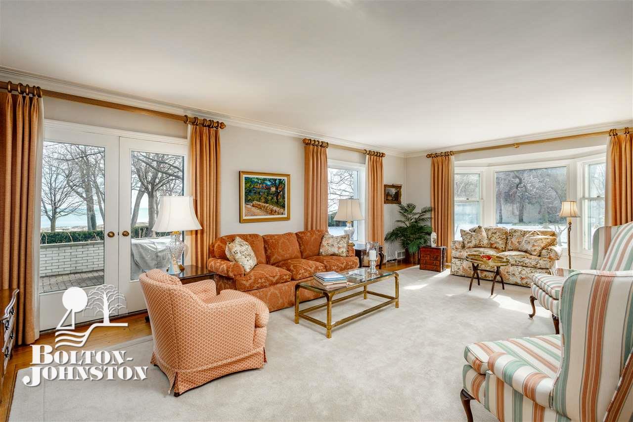 227 Lake Shore Road Grosse Pointe, MI 48236 - Photo 7 of 48 The living room opens up to the fantastic lake views.