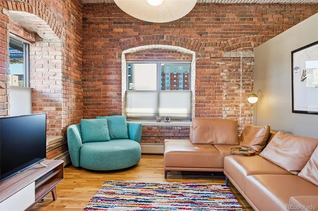 a view of a chairs and table in patio