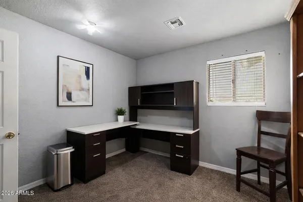 a room with furniture and a window