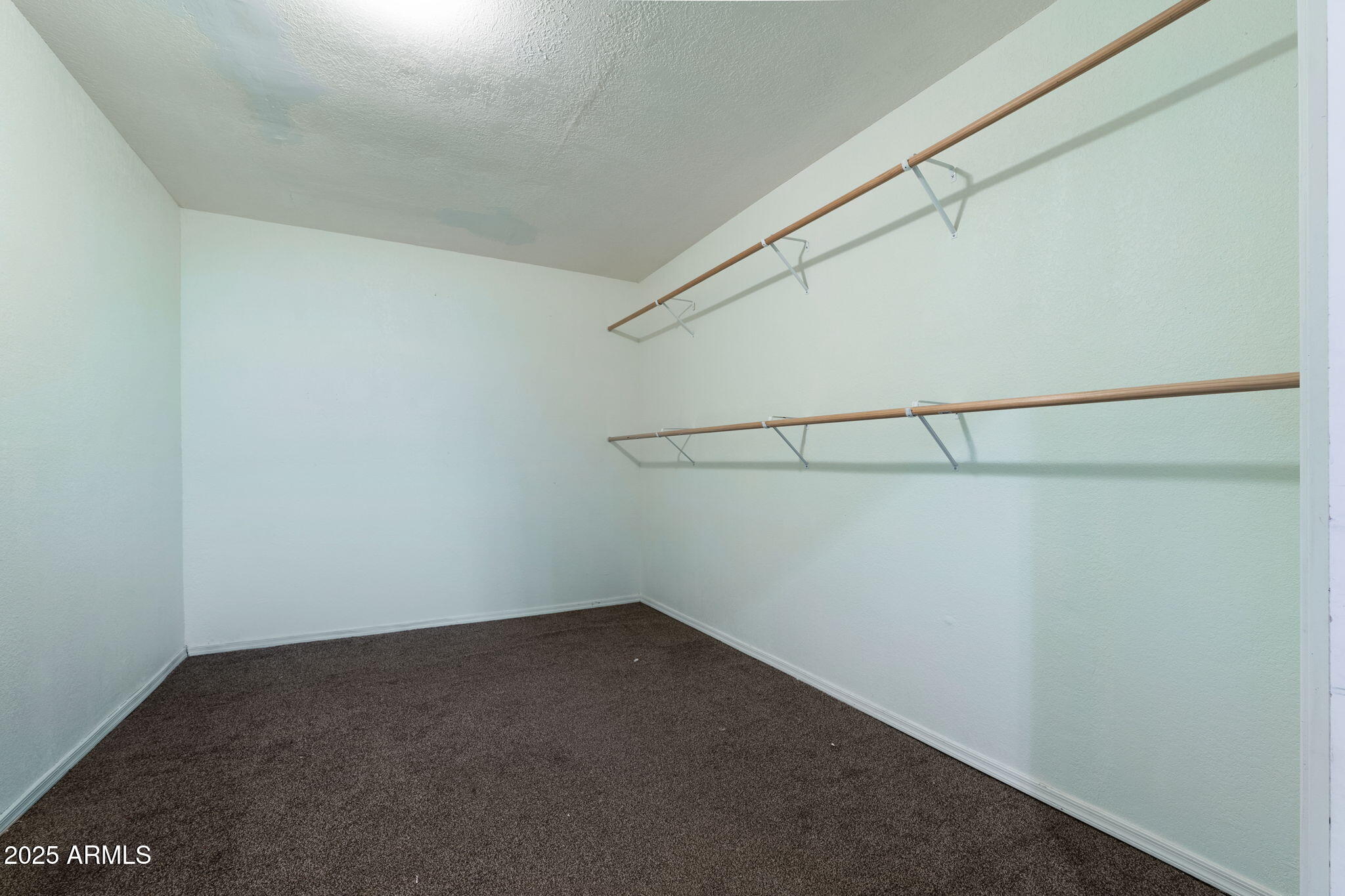 117 North Arroya Road Apache Junction, AZ 85119 - Photo 23 of 27 a view of a room with racks on the wall