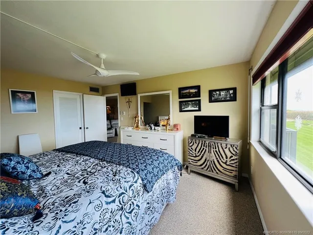 a bathroom with a toilet sink and shower