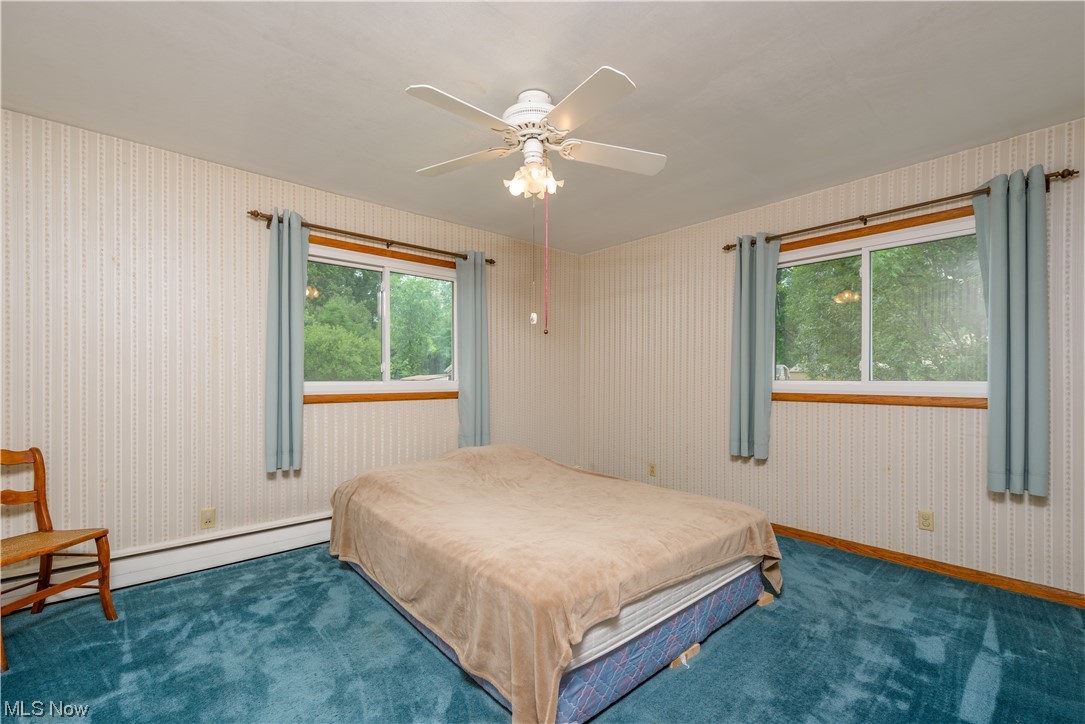 6499 Peck Road Ravenna, OH 44266 - Photo 18 of 33 Hardwood floors under the carpet