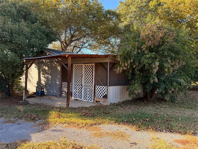 a house view with a backyard space