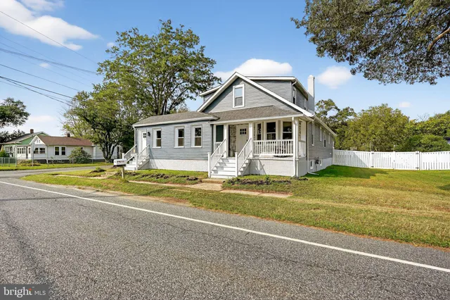 a view of a house with a swimming pool