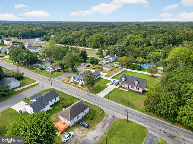an aerial view of a house with a garden