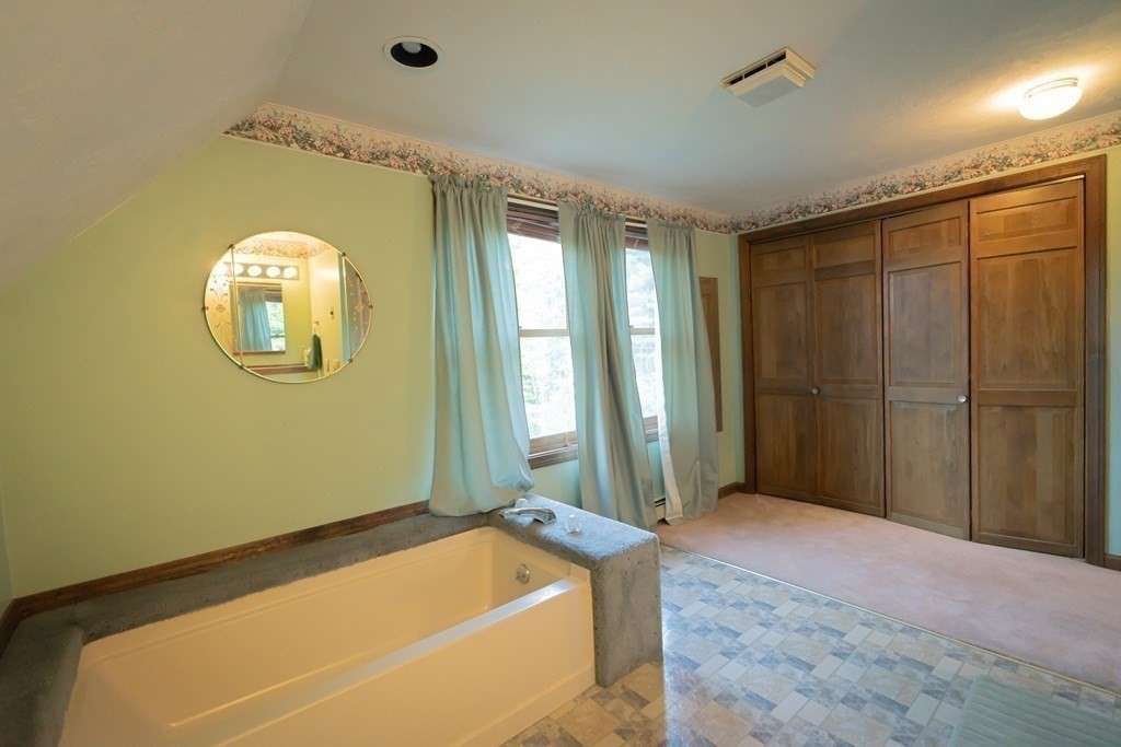 250 Rice Street Athol, MA 01331 - Photo 12 of 24 a bedroom with a bed and a window