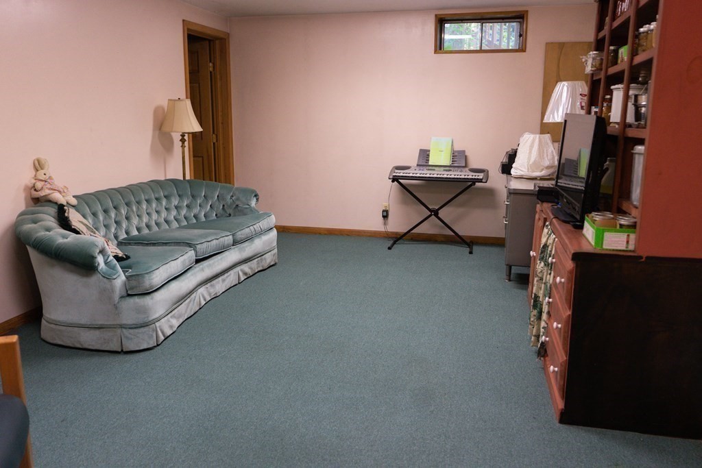 250 Rice Street Athol, MA 01331 - Photo 13 of 24 a living room with furniture and a window