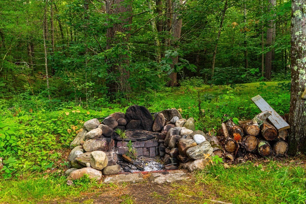 250 Rice Street Athol, MA 01331 - Photo 21 of 24 a backyard of a house with lots of green space