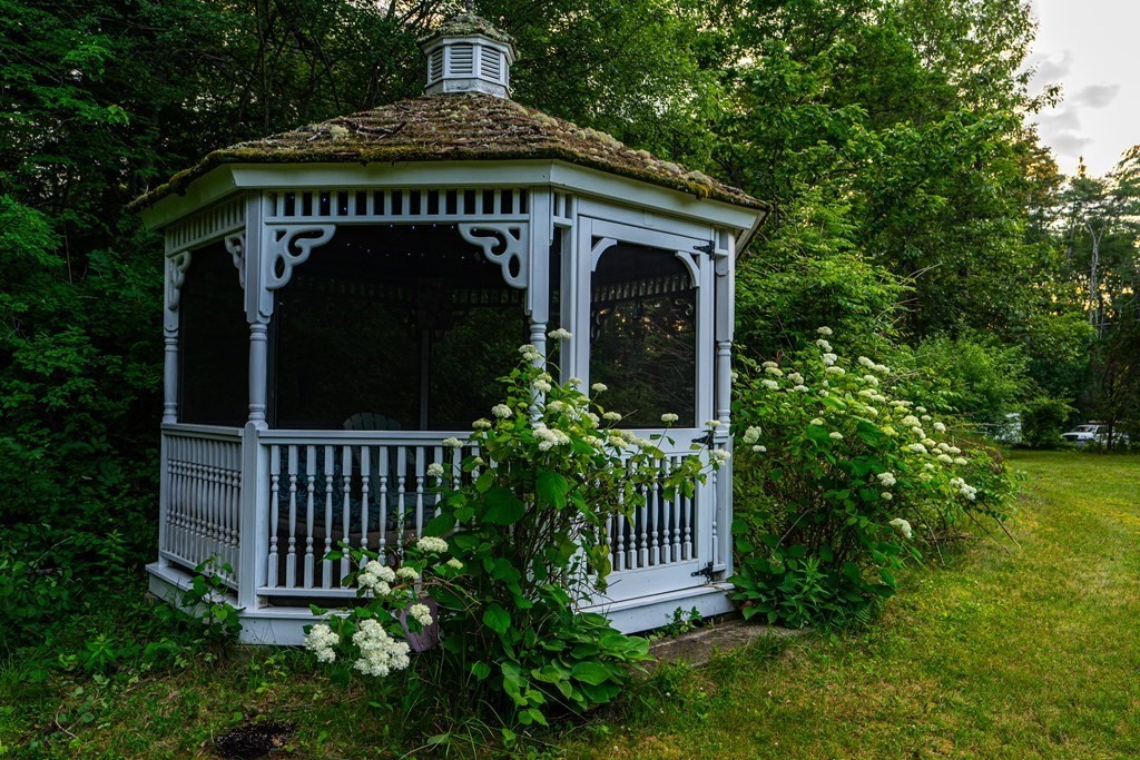 250 Rice Street Athol, MA 01331 - Photo 23 of 24 a front view of a house with garden