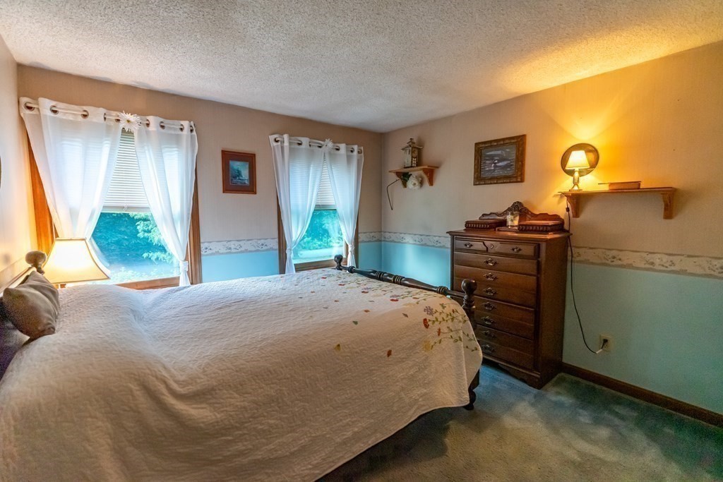 250 Rice Street Athol, MA 01331 - Photo 8 of 24 a bedroom with a bed and a dresser