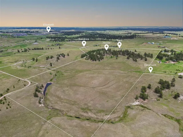 a view of a swimming pool with a lake view