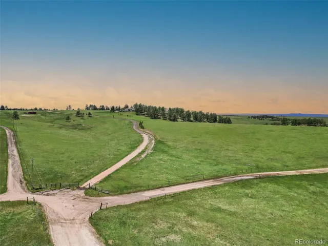 a view of a lake with a big yard