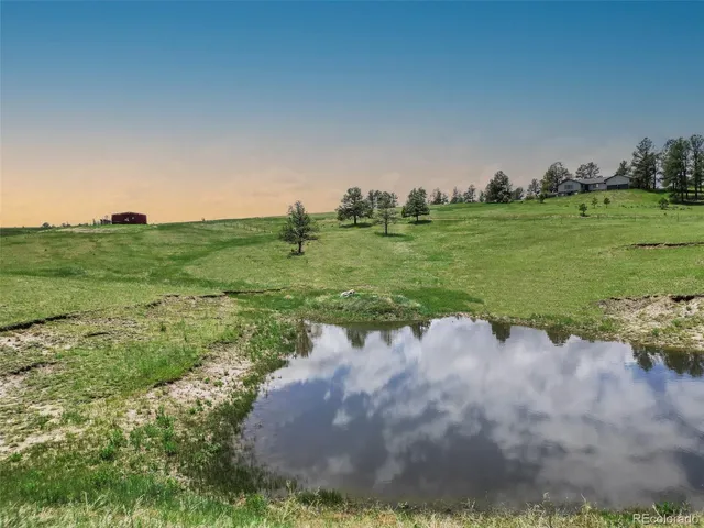 a house view with a garden