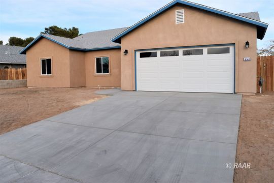 556 South Alvord Street Ridgecrest, CA 93555 - Photo 2 of 28 a view of backyard of house