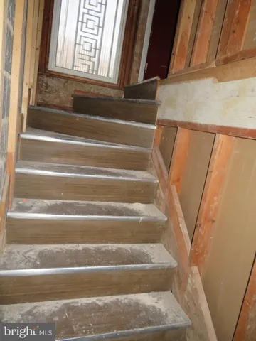 a view of a room that has a large window