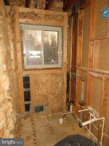 a view of a room with wooden walls