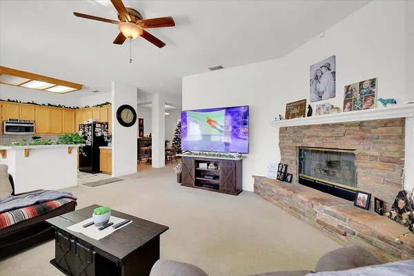 a dining room with furniture and window