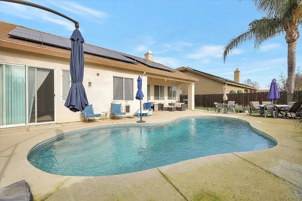 a view of a house with a garden