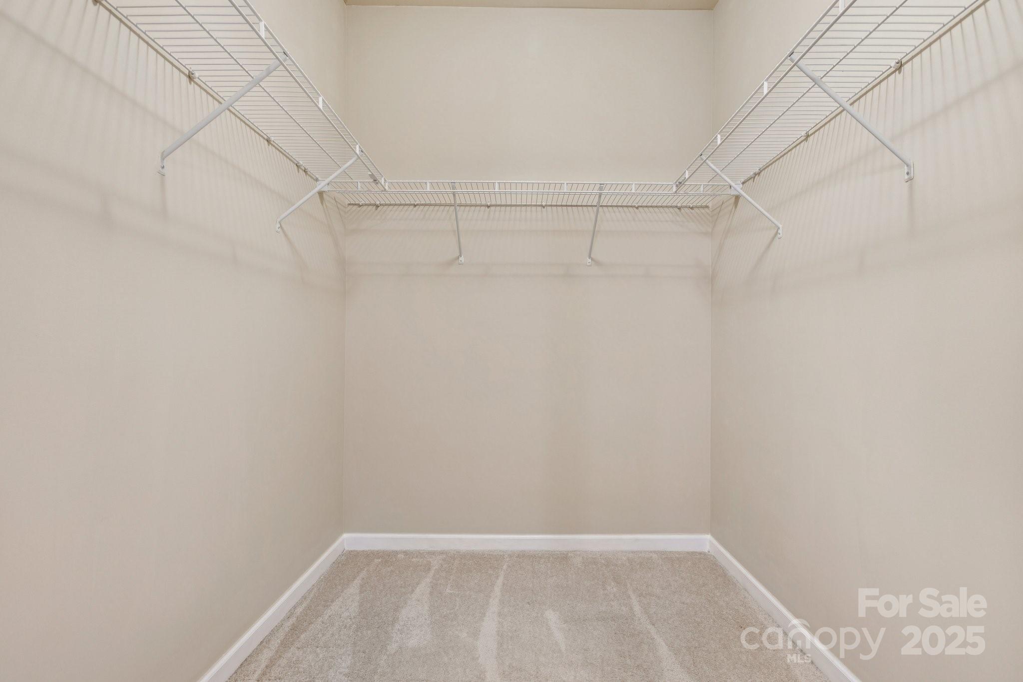 2822 Hopeton Court Monroe, NC 28110 - Photo 14 of 28 a view of a room with racks on the wall