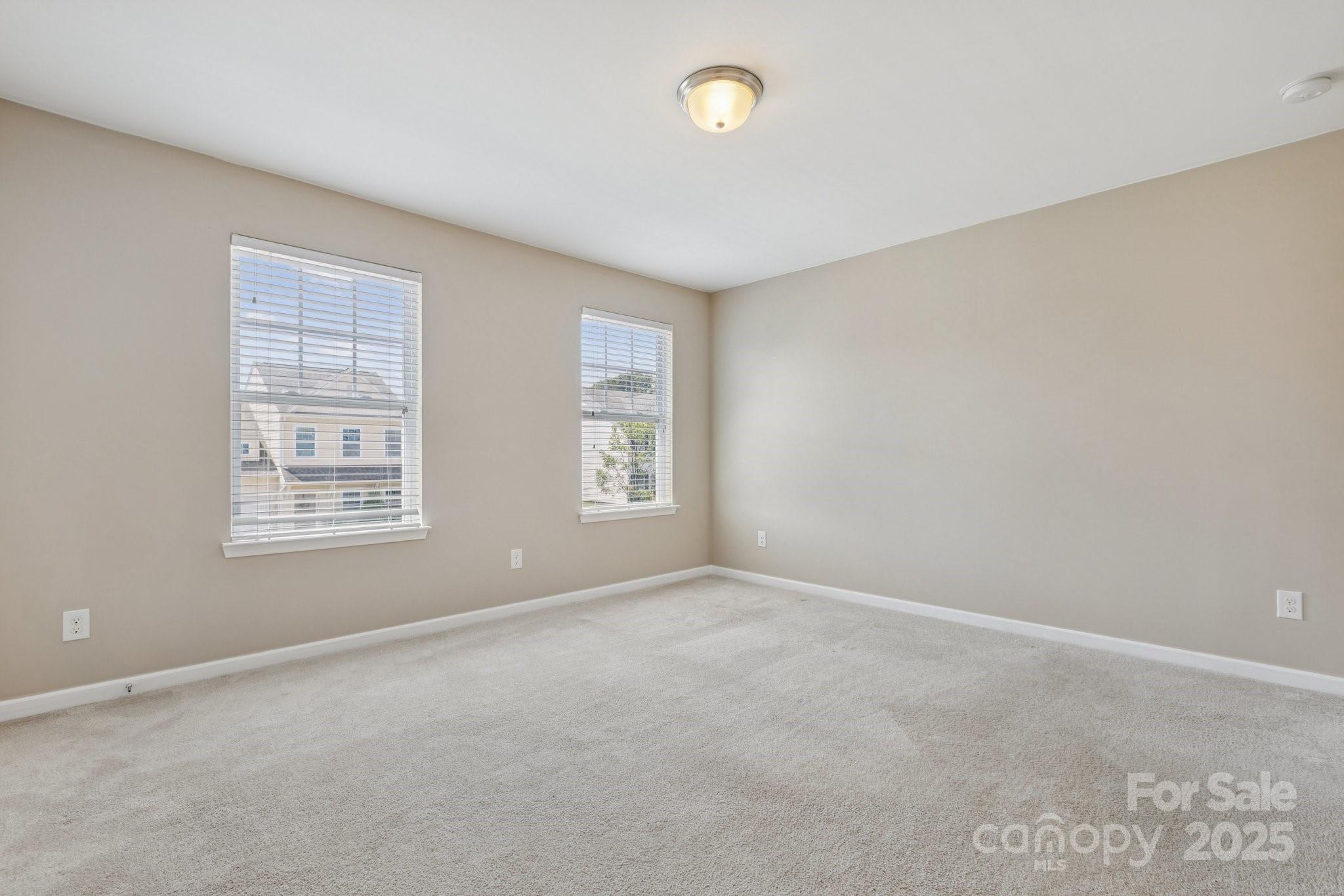 2822 Hopeton Court Monroe, NC 28110 - Photo 21 of 28 an empty room with windows