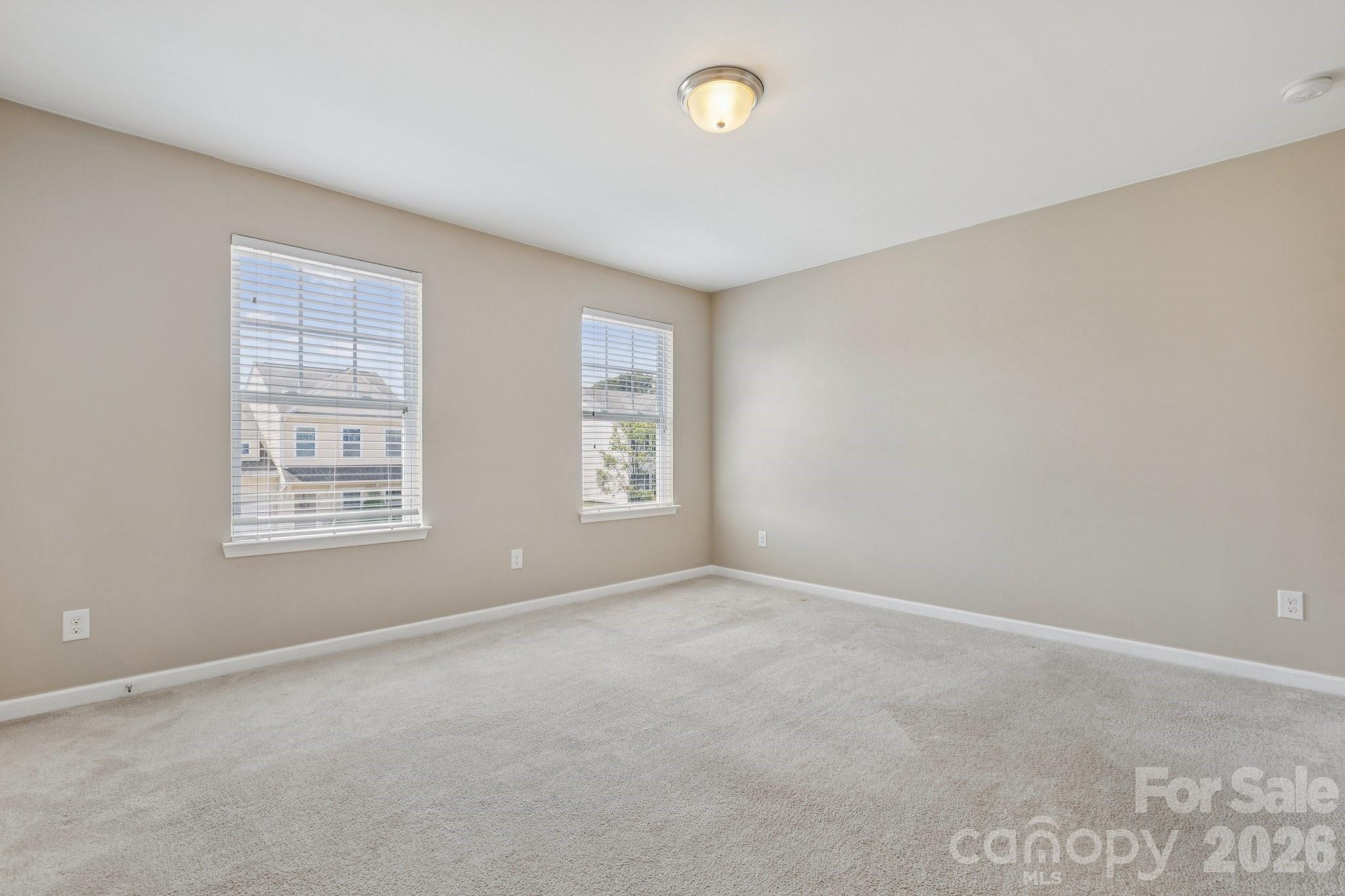 2822 Hopeton Court Monroe, NC 28110 - Photo 25 of 32 an empty room with windows