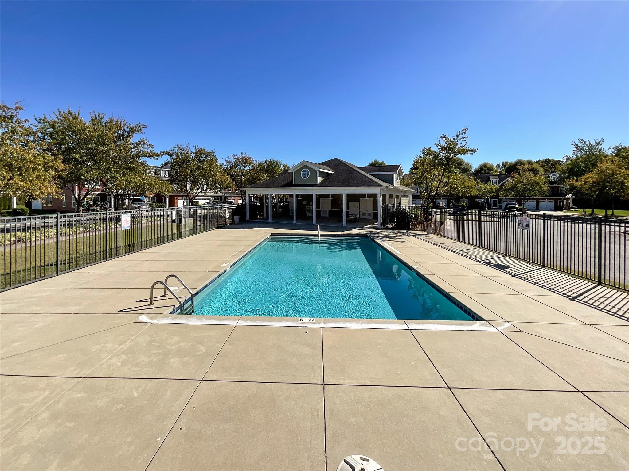 2822 Hopeton Court Monroe, NC 28110 - Photo 27 of 28 a view of a swimming pool with a lounge chairs