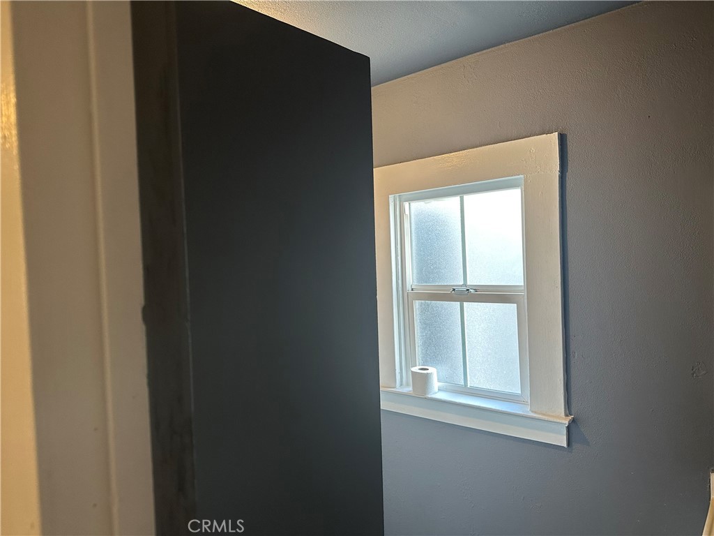 4 West 13th Street Merced, CA 95341 - Photo 15 of 23 a view of an empty room with a window