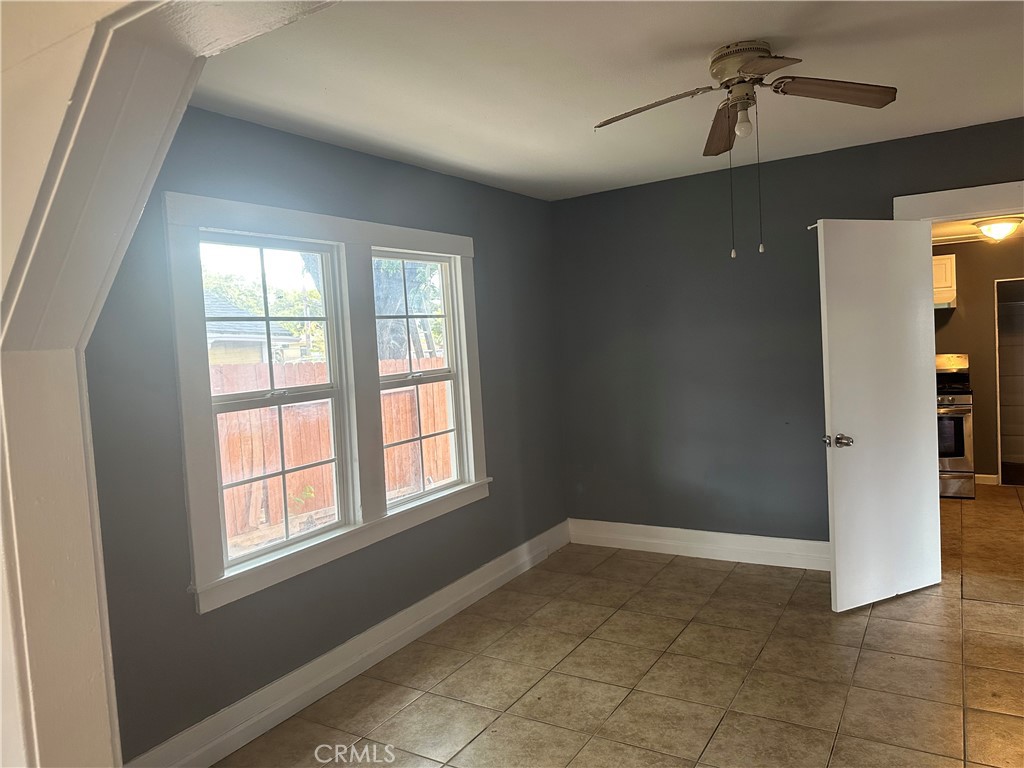 4 West 13th Street Merced, CA 95341 - Photo 7 of 23 an empty room with windows