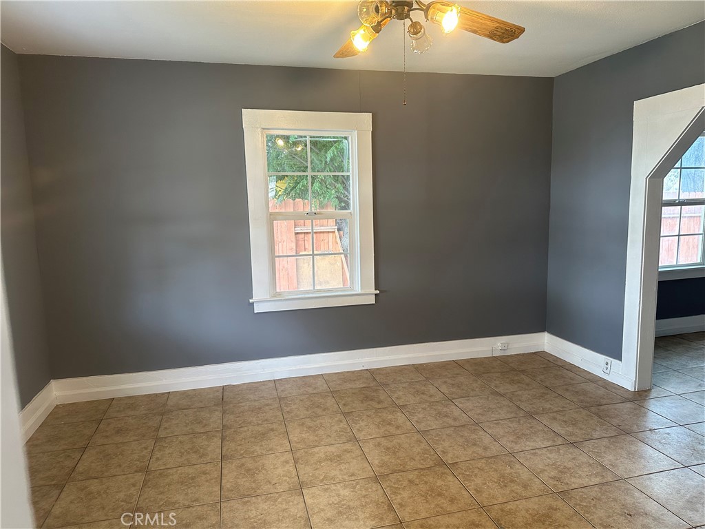 4 West 13th Street Merced, CA 95341 - Photo 10 of 23 an empty room with a window
