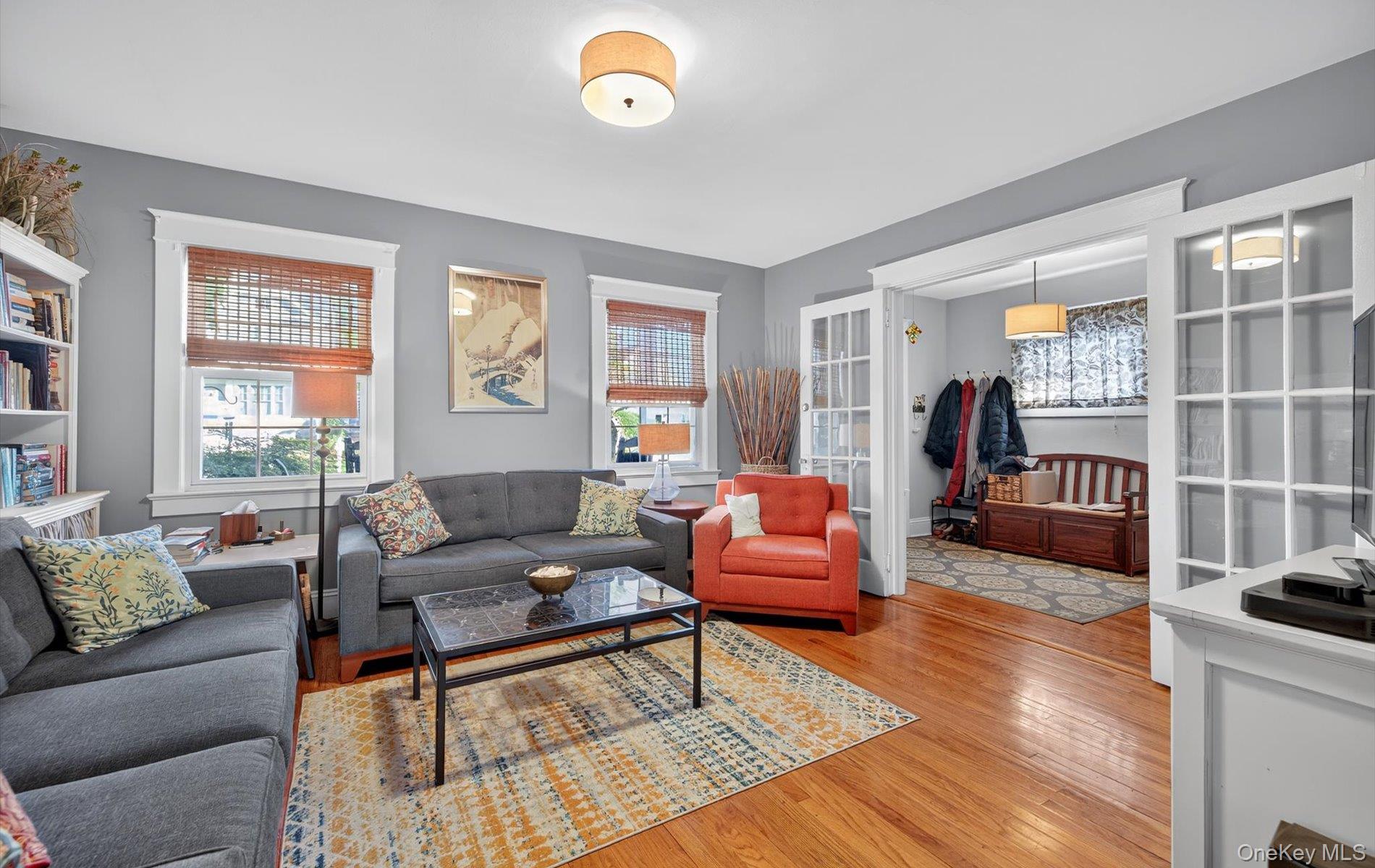 7 Ransom Avenue Sea Cliff, NY 11579 - Photo 13 of 42 a living room with furniture and a table