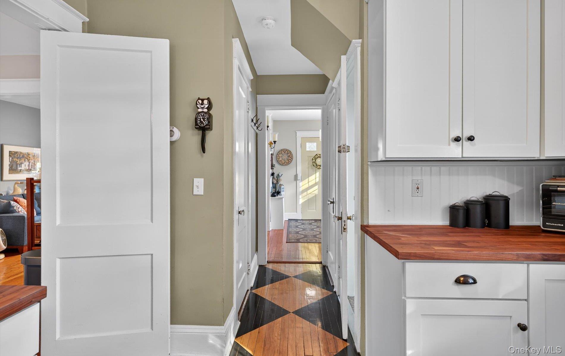 7 Ransom Avenue Sea Cliff, NY 11579 - Photo 20 of 42 a view of a kitchen from the hallway