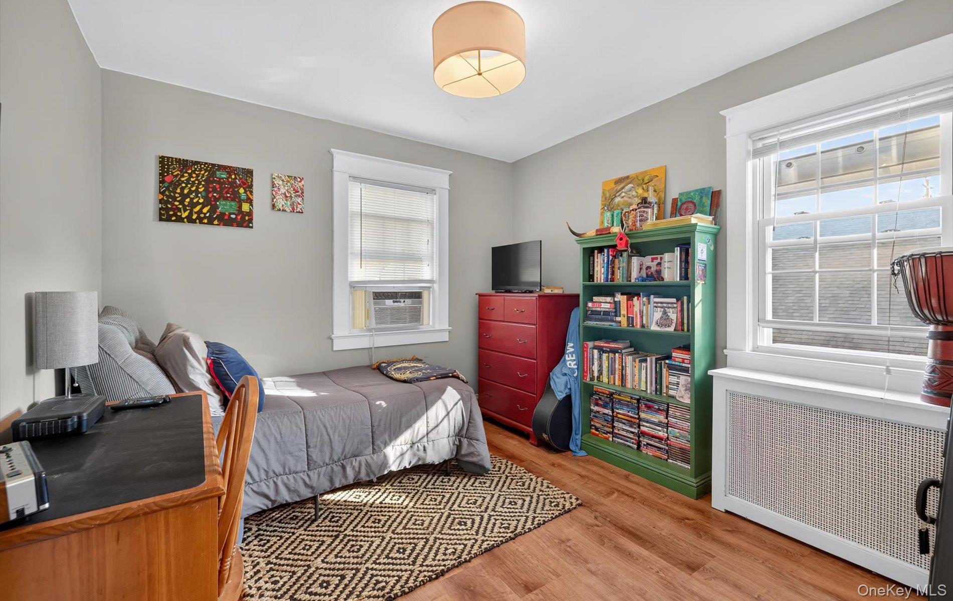 7 Ransom Avenue Sea Cliff, NY 11579 - Photo 28 of 42 a bedroom with furniture and a window