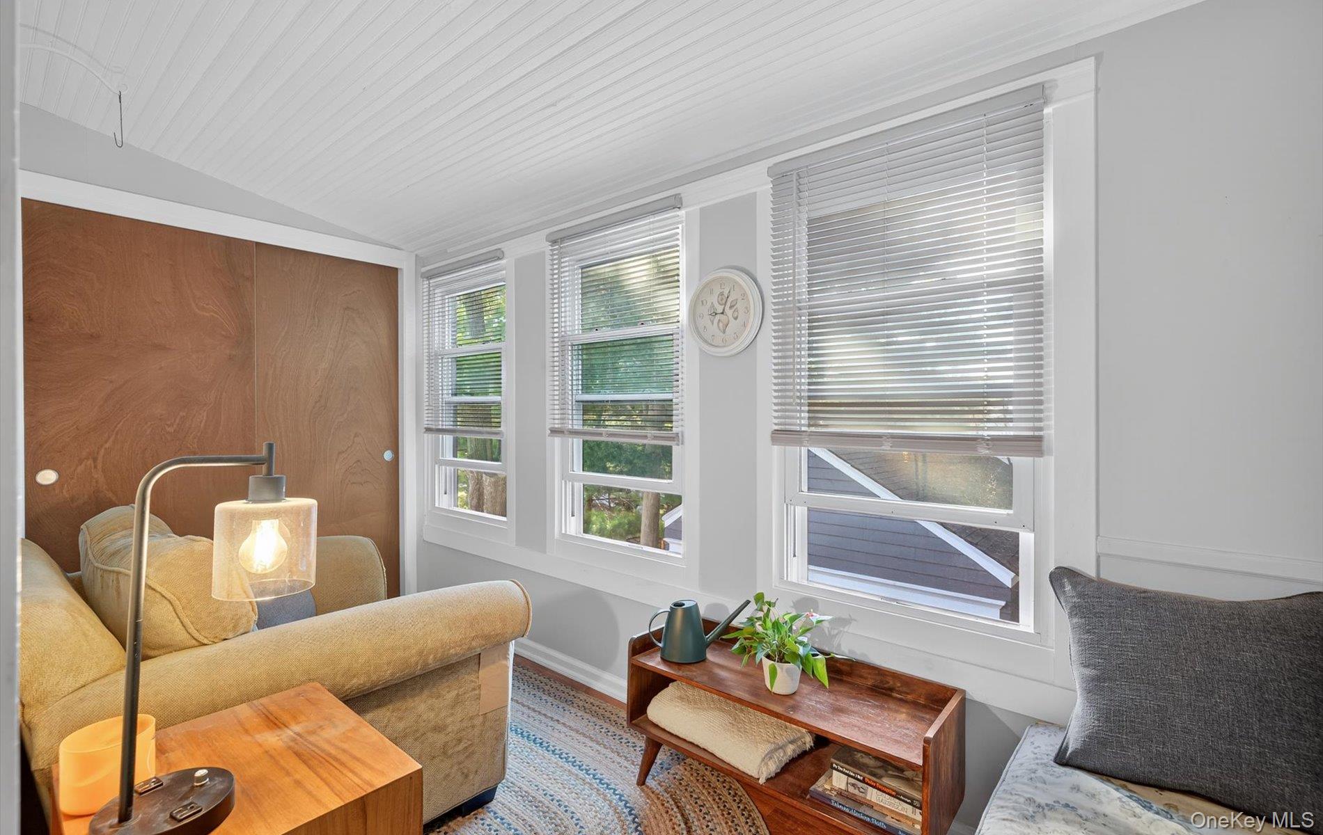 7 Ransom Avenue Sea Cliff, NY 11579 - Photo 29 of 42 a living room with furniture and a window