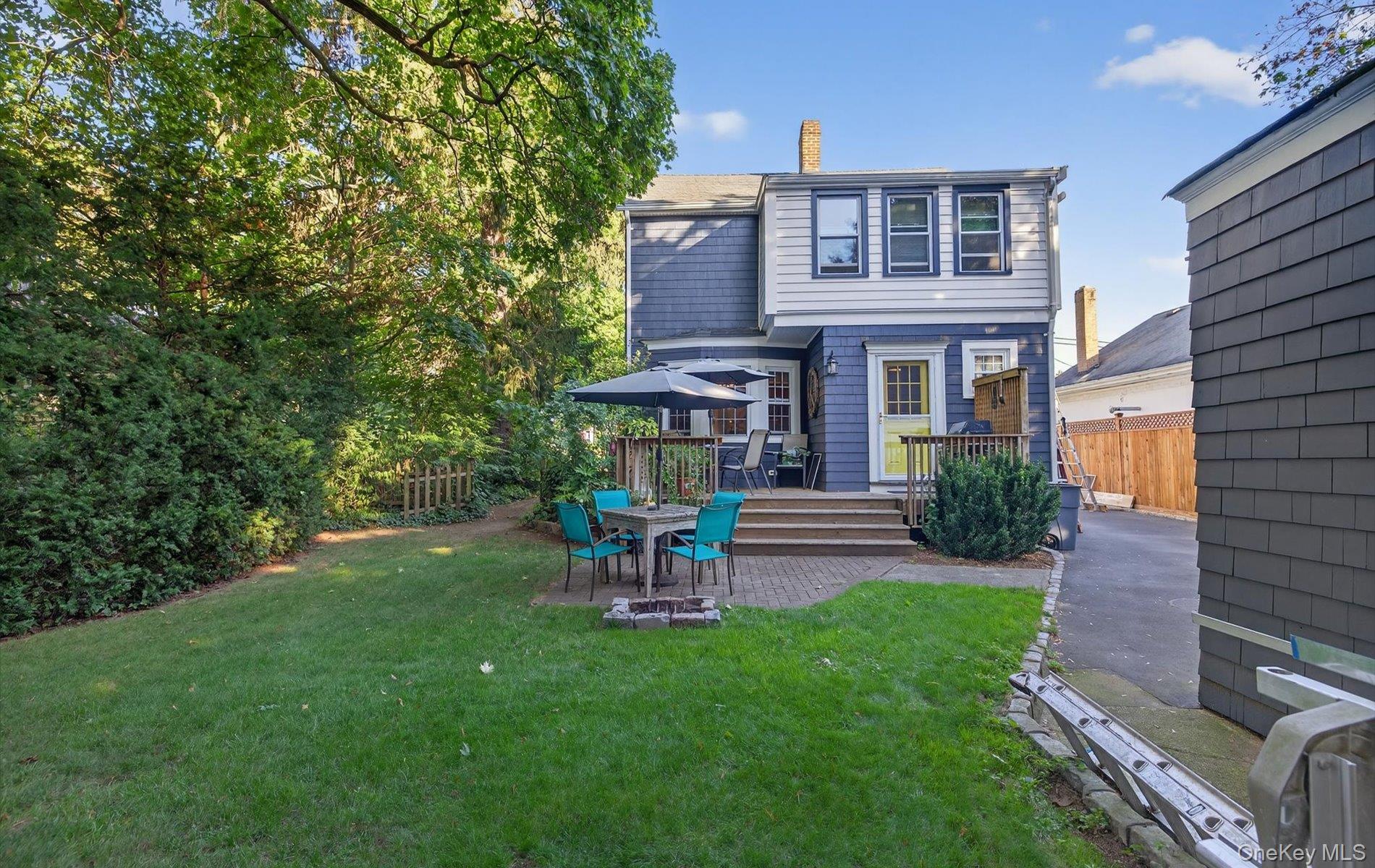 7 Ransom Avenue Sea Cliff, NY 11579 - Photo 41 of 42 a view of a house with a yard porch and sitting area