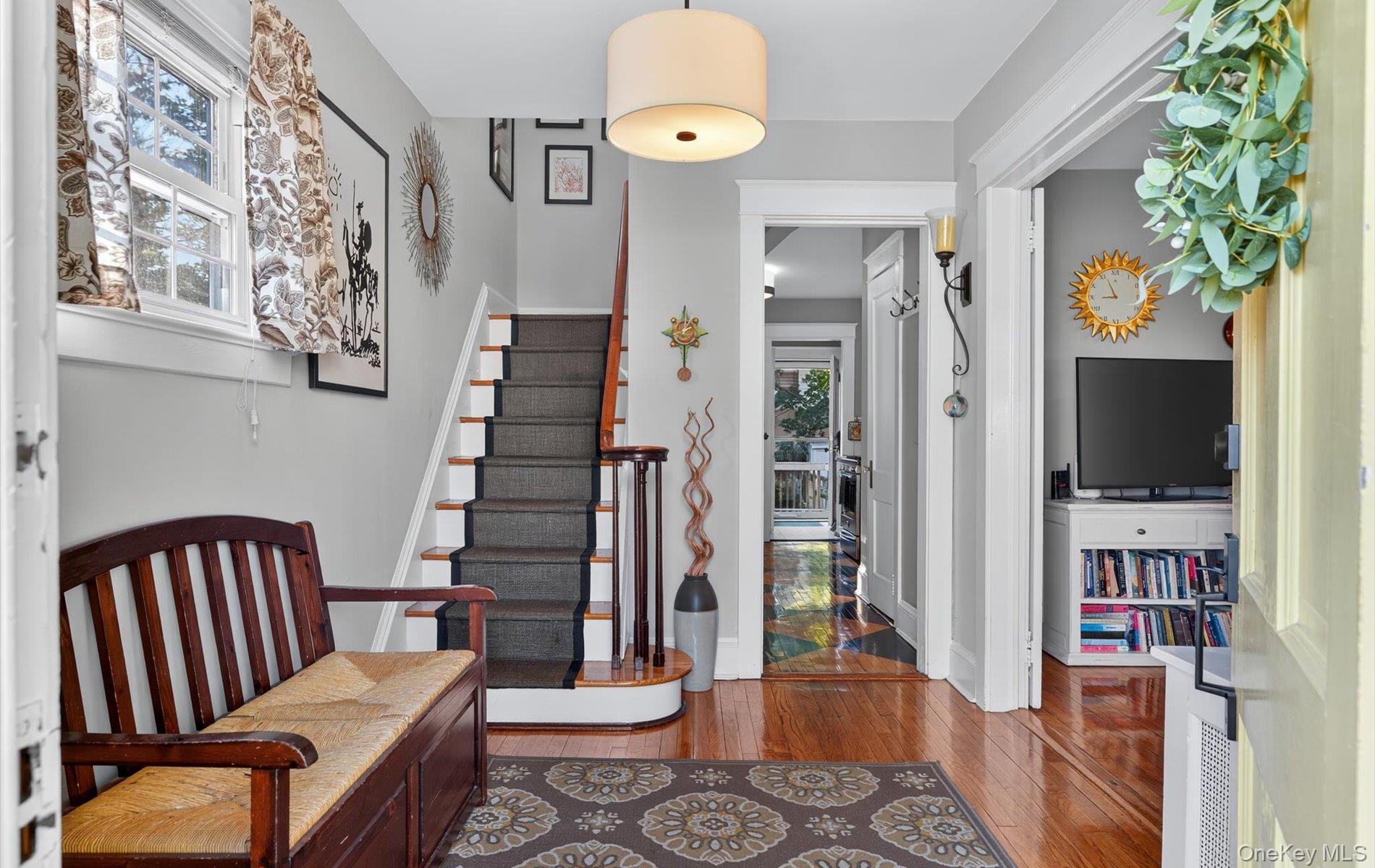 7 Ransom Avenue Sea Cliff, NY 11579 - Photo 7 of 42 a living room with furniture and a flat screen tv