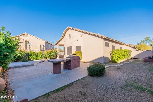a view of a couches in patio and a yard
