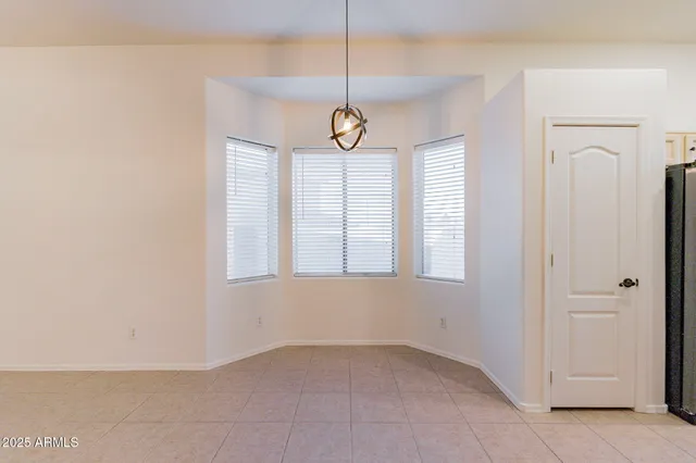 a view of an empty room with window