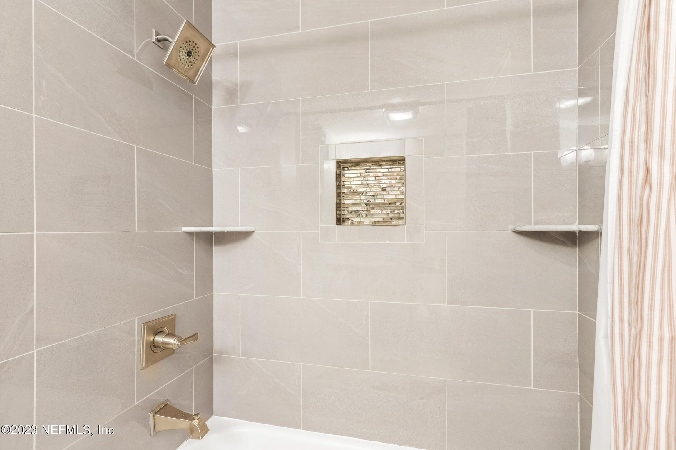 405 Flagler Boulevard, Unit 2A St. Augustine, FL 32080 - Photo 16 of 30 a bathroom with a shower