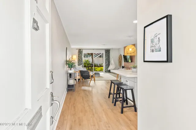 a view of a living room and dining room