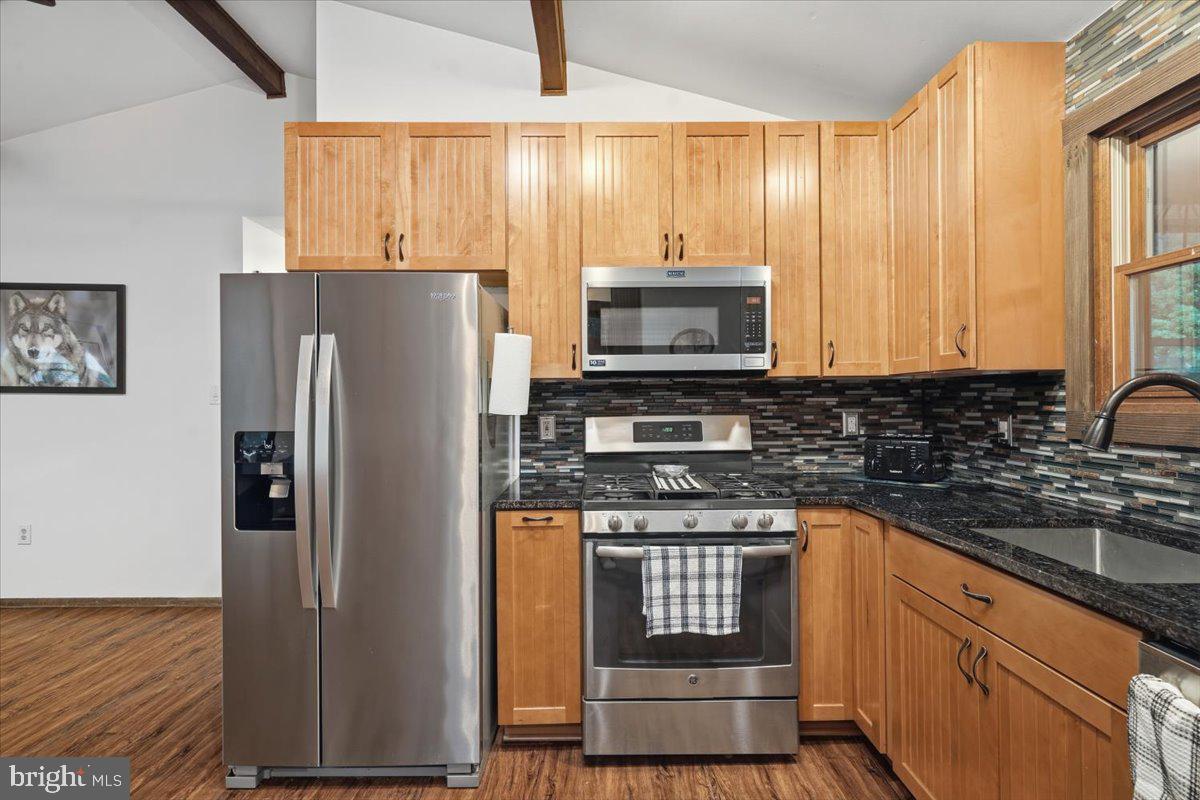 177 Jay Effort, PA 18330 - Photo 20 of 47 Modern kitchen with warm wood tones.
