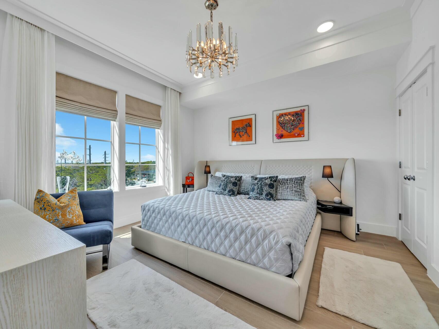 206 Henderson Resort Way, Unit 5202 Destin, FL 32541 - Photo 16 of 55 a bedroom with a bed and window