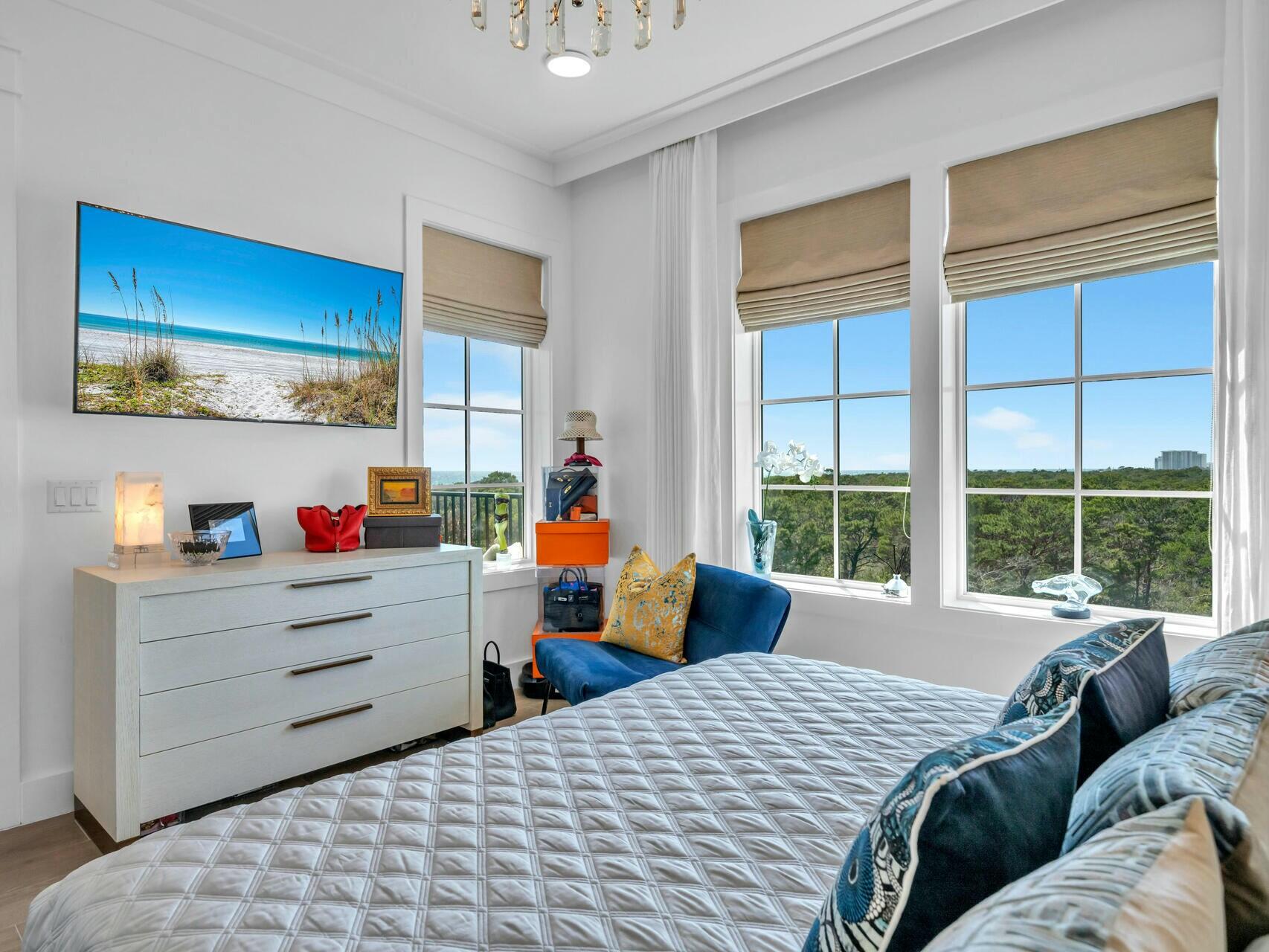 206 Henderson Resort Way, Unit 5202 Destin, FL 32541 - Photo 18 of 55 a bedroom with a bed and a window